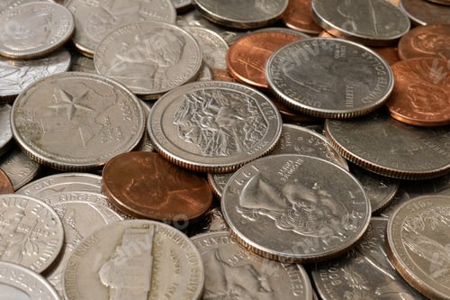 Preview: American money. Large pile of coins of American cents of different denominations.