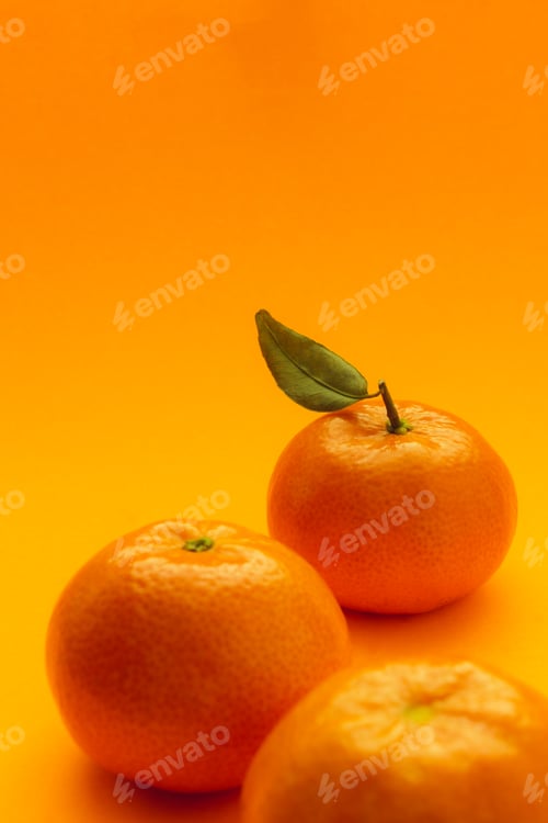 Preview: tangerines with orange background
