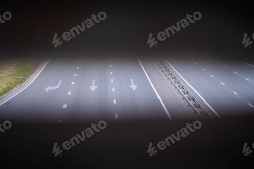 Preview: forward and left arrow on the track. White arrow sign painted on black asphalt.
