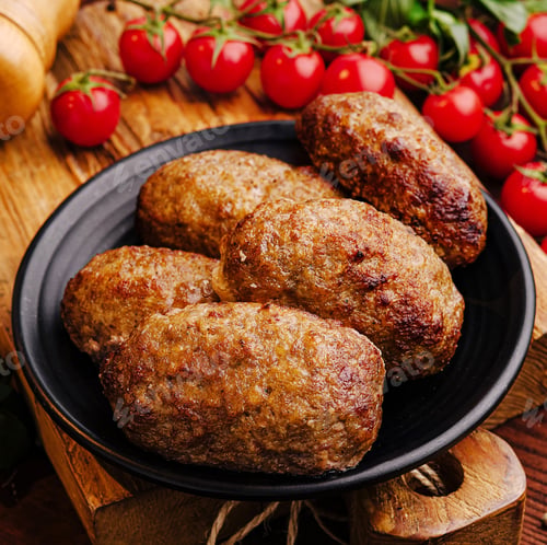 Preview: Traditional meatballs served with fresh cherry tomatoes