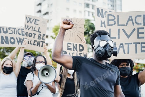 Preview: Activist wearing gas mask protesting against racism and fighting for equality
