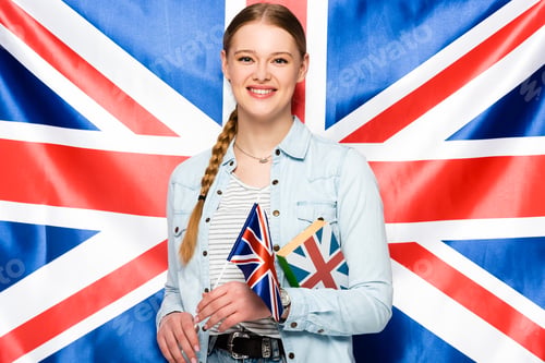 Preview: smiling pretty girl with braid holding book on uk flag background