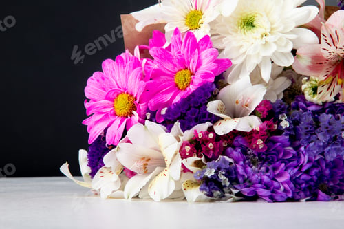 Preview: side view of a bouquet of pink white and purple color statice alstroemeria