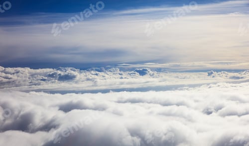 Preview: Blue sky and clouds - view from plane window