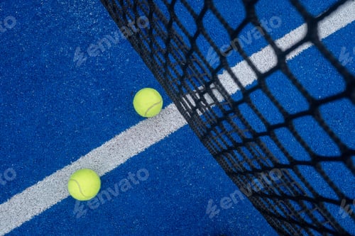 Preview: net of a paddle tennis court and two balls, top view