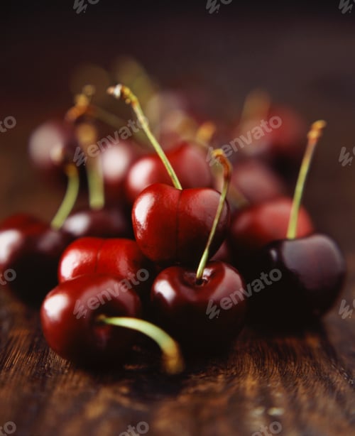 Preview: Fresh black cherries on wooden table, close-up