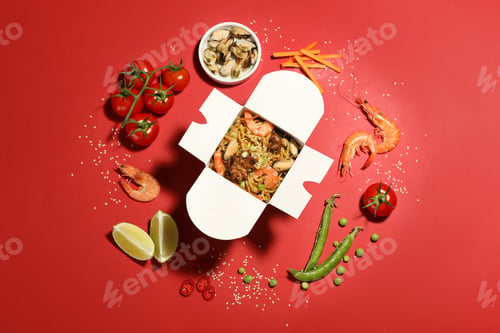 Preview: Flat lay composition with noodle wok and ingredients on red background