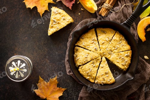 Preview: Breakfast table with pumpkin scones and milk.