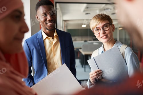 Preview: Diverse Business Team Communicating in Office