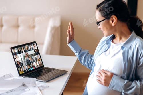 Preview: work pregnant woman mixed race adult happy video call online laptop
