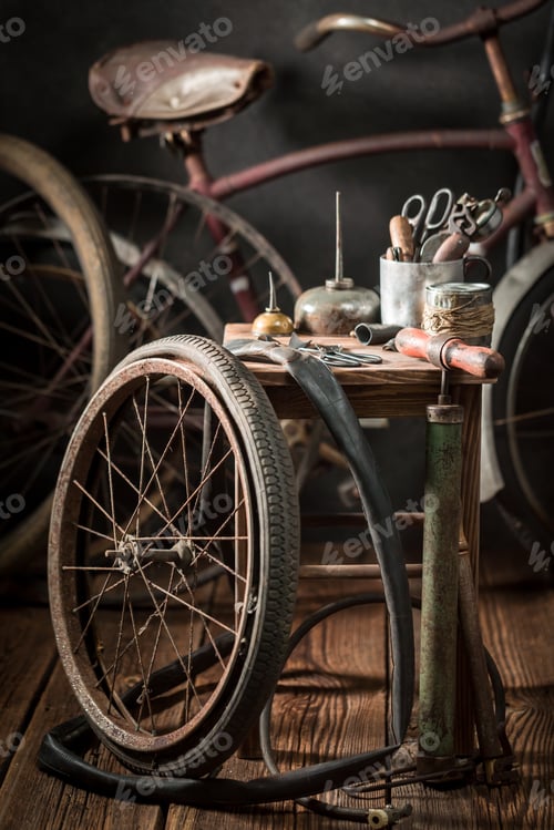 Preview: Old bike fix service with wheels, tools, and rubber patch