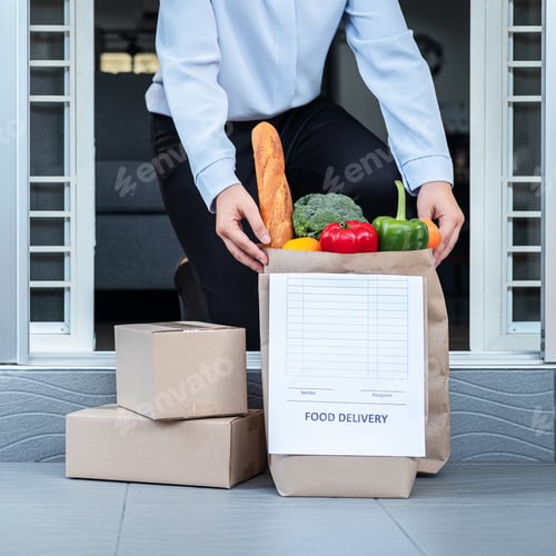 Preview: Asian woman customer in quarantine time order food delivery online and courier place grocery bag