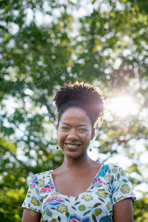 Preview: A young women in a woodland glade.
