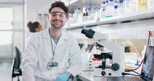 Preview: Portrait, scientist and happy man on microscope in lab for chemistry research, test or innovation.