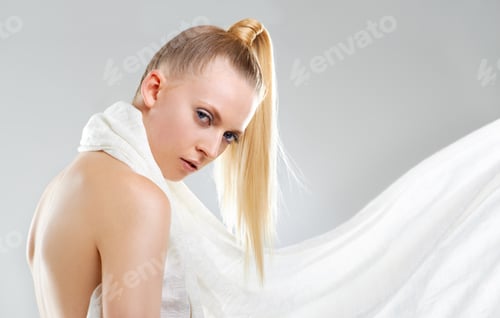 Preview: Blonde Woman Posing with White Flowing Fabric