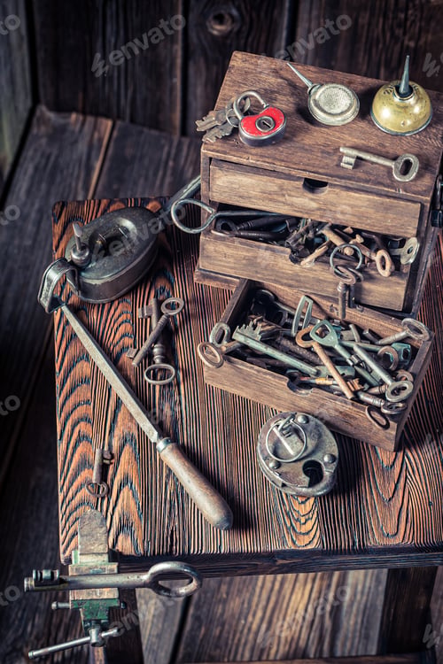Preview: Vintage locksmiths workshop with keys and locks. Ancient locksmiths workshop.
