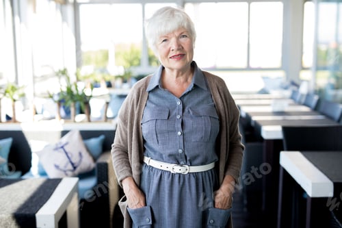 Preview: Modern Senior Woman Posing in Cafe