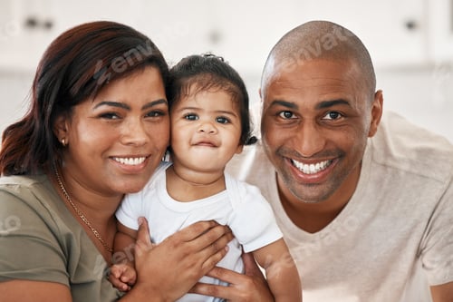 Preview: A blessing in human form. Shot of a young family spending time together at home.