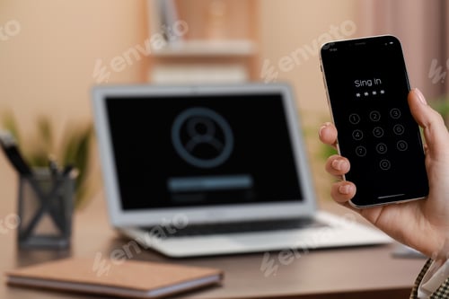 Preview: Woman holding smartphone with blocked screen indoors, closeup. Space for text