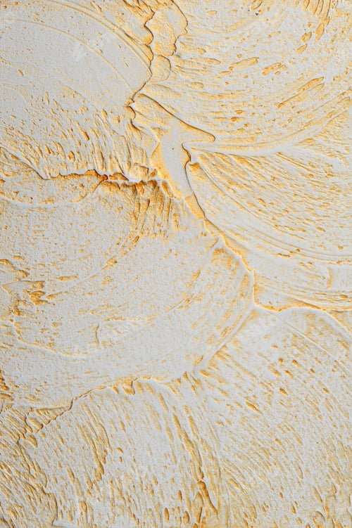 Preview: Decorative Venetian plaster with a natural stone texture in warm shades and gold