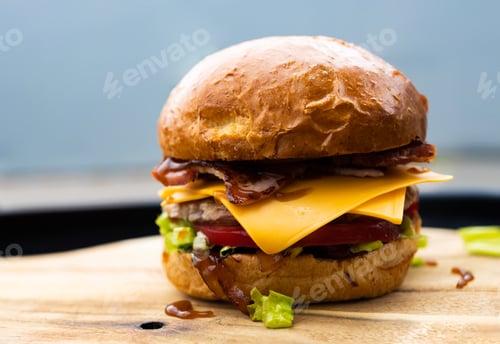 Preview: Delicious Cheese Beef Burger consists of Bun Bread, Patty, Pickle, Onion, Mayonaisse, Ketchup and Ch