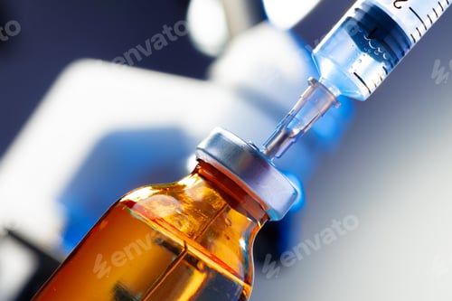 Preview: Medical vial with medication and syringe close up