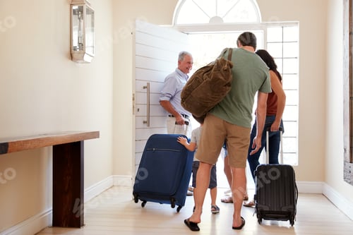 Preview: Three generation white family leaving their home to go on holiday together, full length, back view