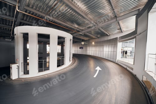 Preview: Road from parking lot in the modern airport at daytime