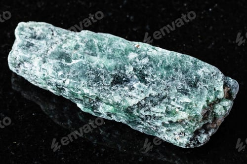 Preview: sample of raw green kyanite mineral on black
