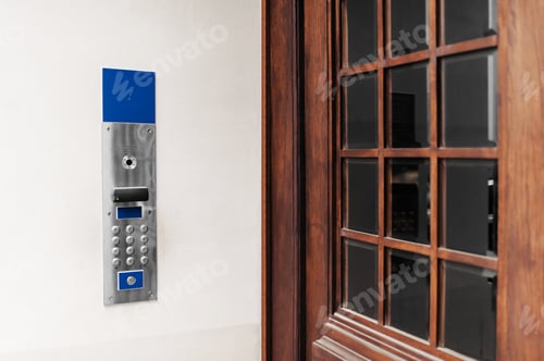 Preview: Modern intercom on white wall near door outdoors