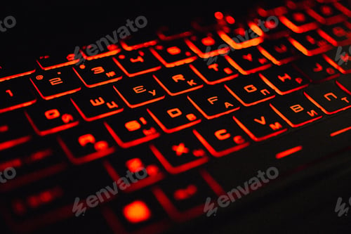 Preview: Closeup shot of a keyboard with red neon led lights