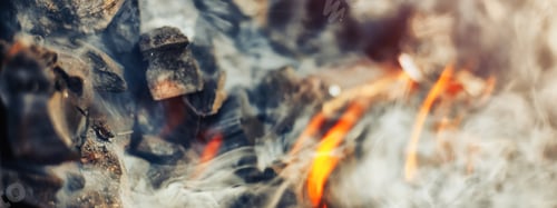 Preview: actively smoldering embers of fire coal barbeque