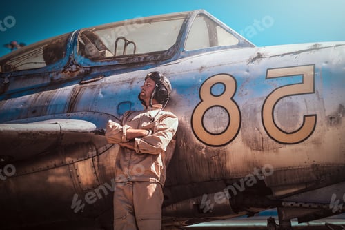 Preview: Man is standing near retro jet.