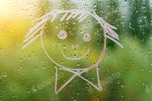Preview: Positive smiley on a rainy autumn window
