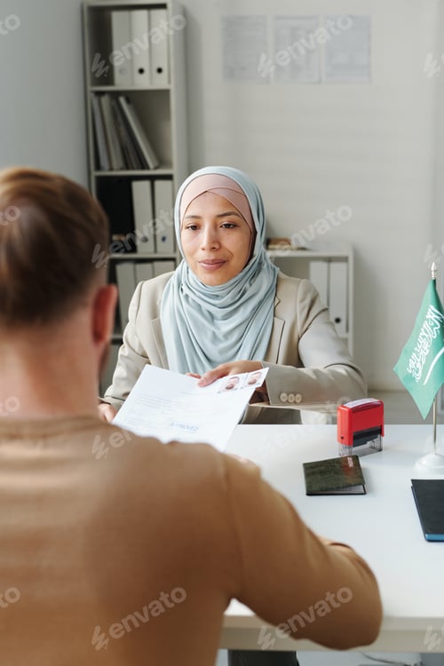 Preview: Muslim Woman Working With Client