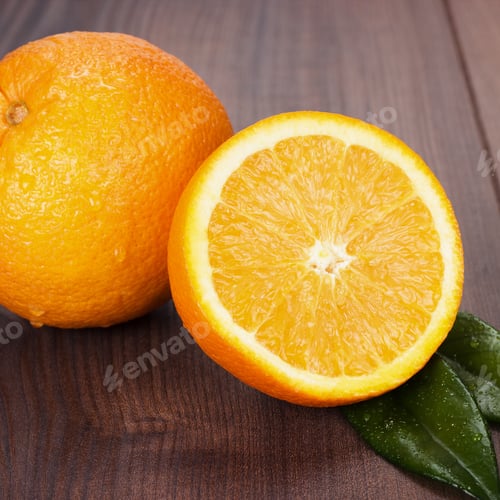 Preview: Fresh Oranges On Brown Wooden Table