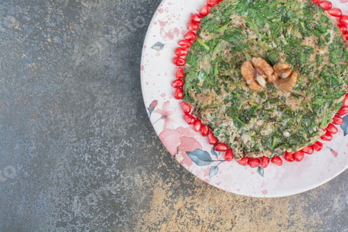 Preview: Scrambled eggs with greens decorated with pomegranate seeds