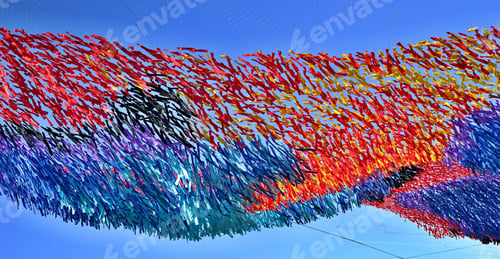 Preview: Festive Abstract Tinsel Closeup From Color Tapes Of Fabric Or From Textile Material Against The