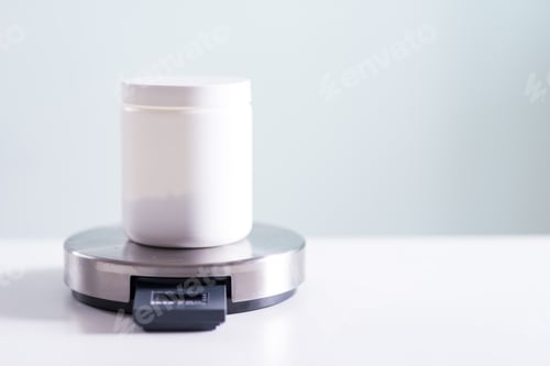 Preview: Protein powder jar on scales