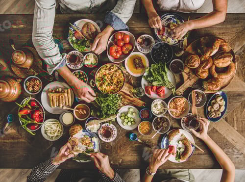 Preview: Flat-lay of Turkish family during traditional Middle Eastern breakfast