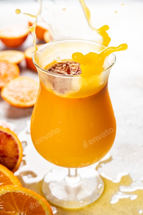Preview: cocktail orange juice drink fresh appetizer meal food snack on the table copy space food background