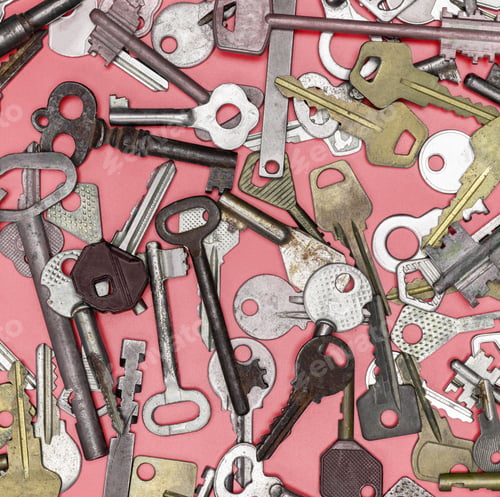 Preview: Keys set on pink background. Door lock keys and safes for proper