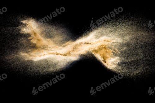 Preview: Golden sand explosion isolated on black background