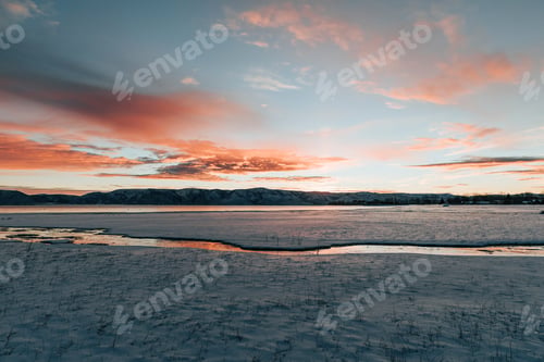 Preview: pink morning sunrise over a lake