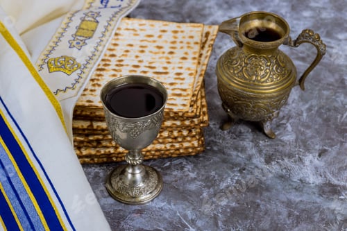 Preview: During Passover Jews eat kosher unleavened matzah bread and drink kosher kiddush wine.