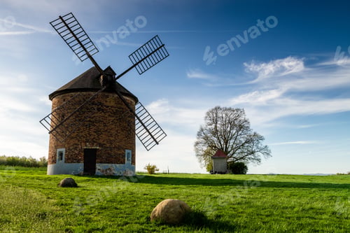 Preview: springtime at the chvalkovice windmill with blooming orchards