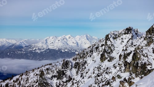 Preview: Snow and Cloud covered Canadian Nature Landscape Background. Winter Season in Whistler
