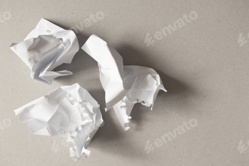 Preview: Crumpled paper balls from notebook with copy space on gray background. Bad idea concept