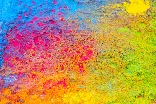 Preview: Holi coloured powder background. Traditional holi paint texture.
