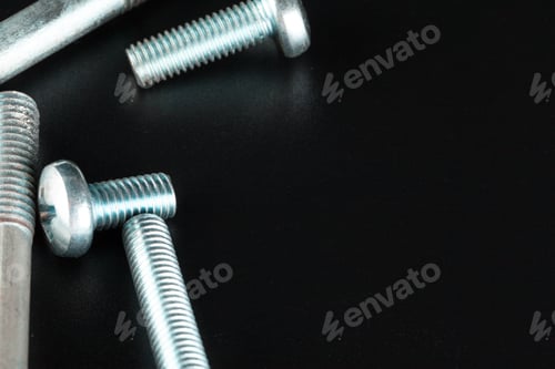 Preview: screws on black background
